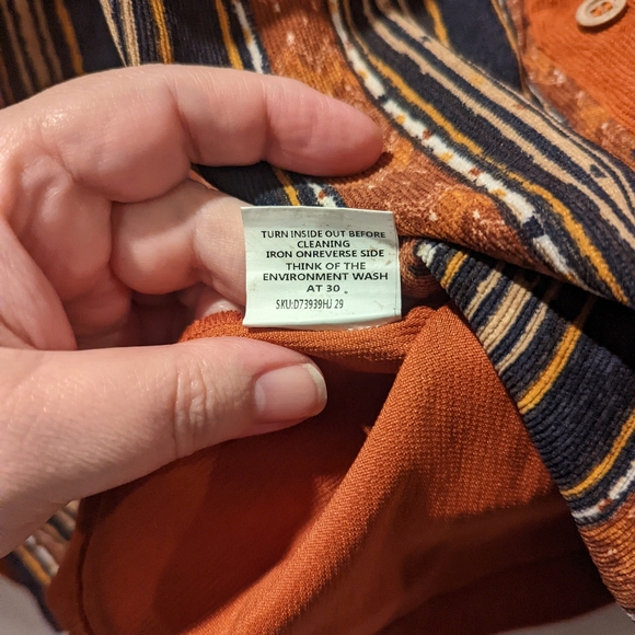 Zanzia orange and multi striped button down tunic in a ribbed polyester. - Picture 5 of 7